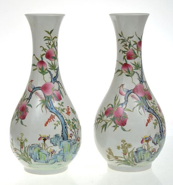 Appraisal: A PAIR OF CHINESE ENAMELLED PORCELAIN BALUSTER PEACH DECORATED VASES