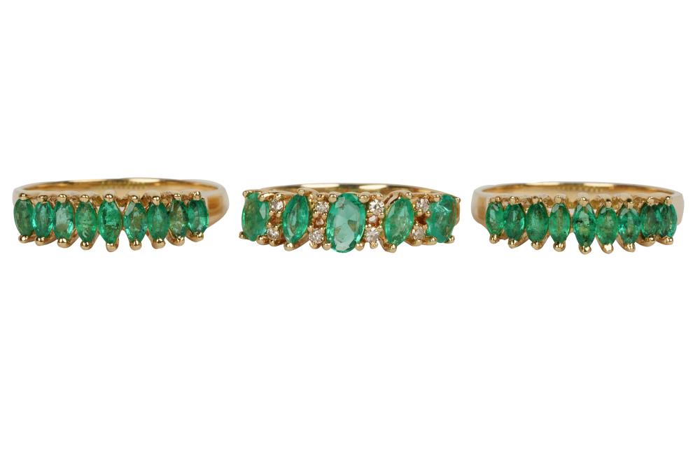 Appraisal: THREE KARAT YELLOW GOLD EMERALD RINGSone ring containing five oval