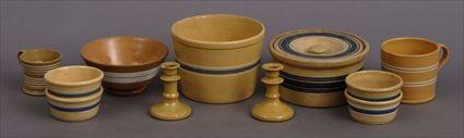 Appraisal: ELEVEN ASSORTED YELLOWWARE ARTICLES Including bowls mugs crocks a pair