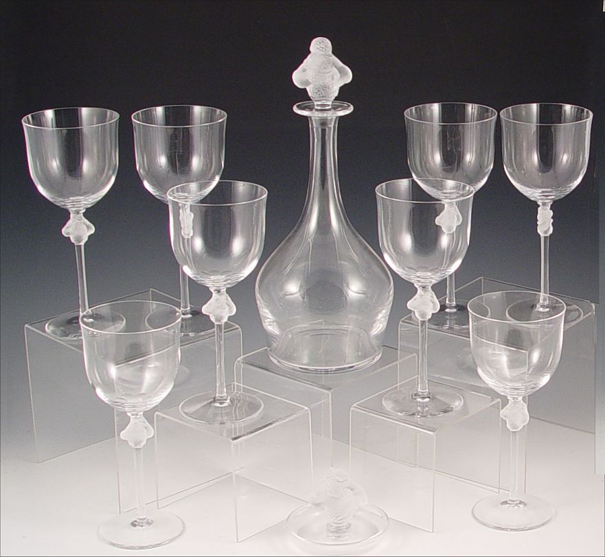 Appraisal: LALIQUE FRENCH CRYSTAL DECANTER AND STEMS IN THE ROXANE PATTERN