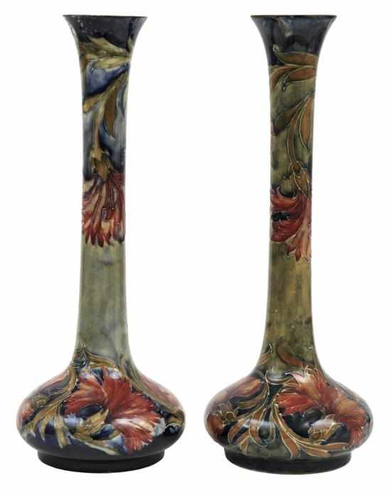 Appraisal: TWO SIMILAR SLENDER MOORCROFT SPANISH PATTERN VASES CIRCA Each of