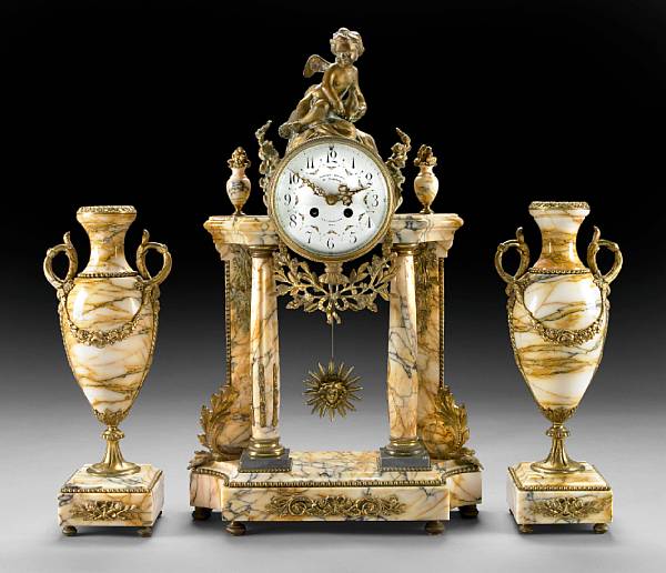 Appraisal: A French marble and gilt metal mounted clock garniture early