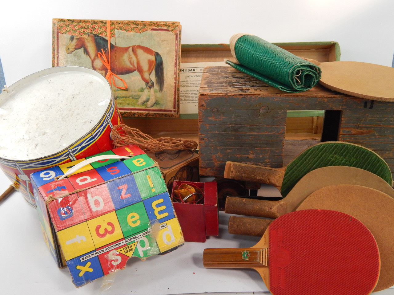 Appraisal: A vintage child's wooden pull-a-long train truck tin drum Cum-Bak