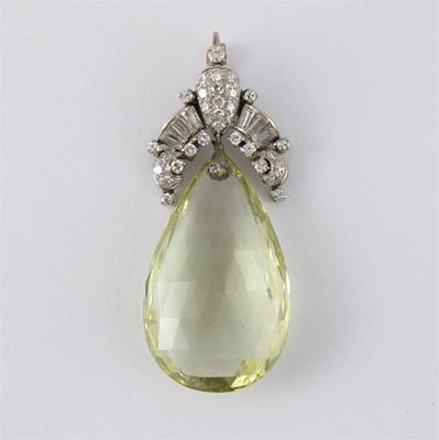 Appraisal: A diamond and beryl pendant The pear shaped beryl suspends