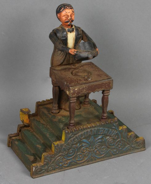 Appraisal: th Century cast iron mechanical bank Magician Bank by J