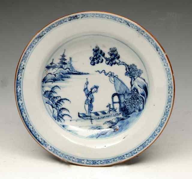 Appraisal: A CHINESE BLUE AND WHITE DISH with girl punting th