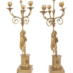 Appraisal: A Pair of Louis XV Style Gilt Metal Three-Light Candelabra