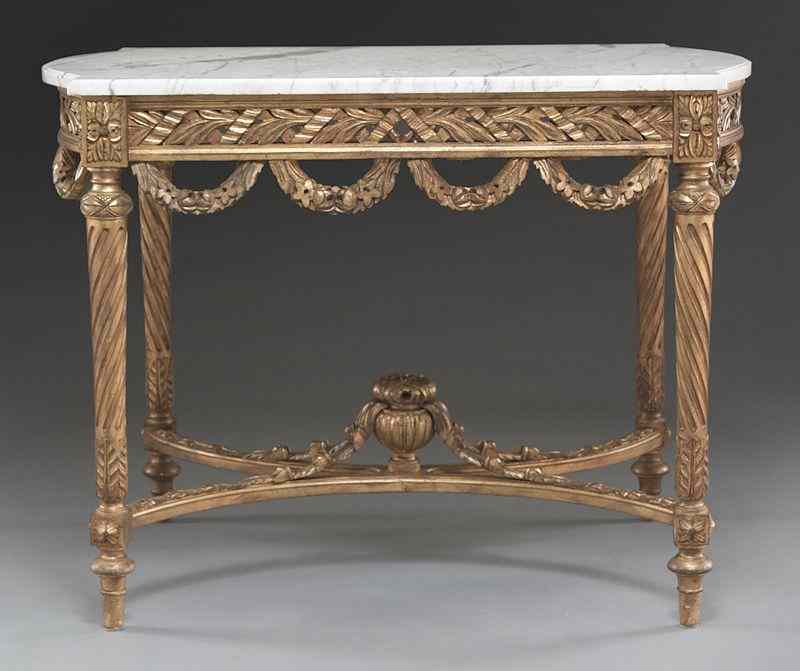 Appraisal: Louis XVI style gilt marble top center tablewith rounded ends