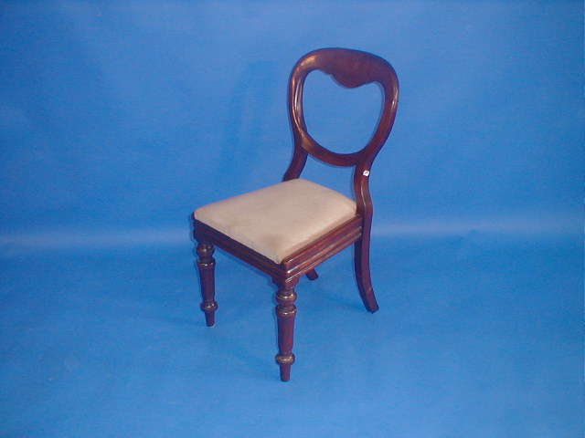 Appraisal: A set of four Victorian mahogany balloon back dining chairs