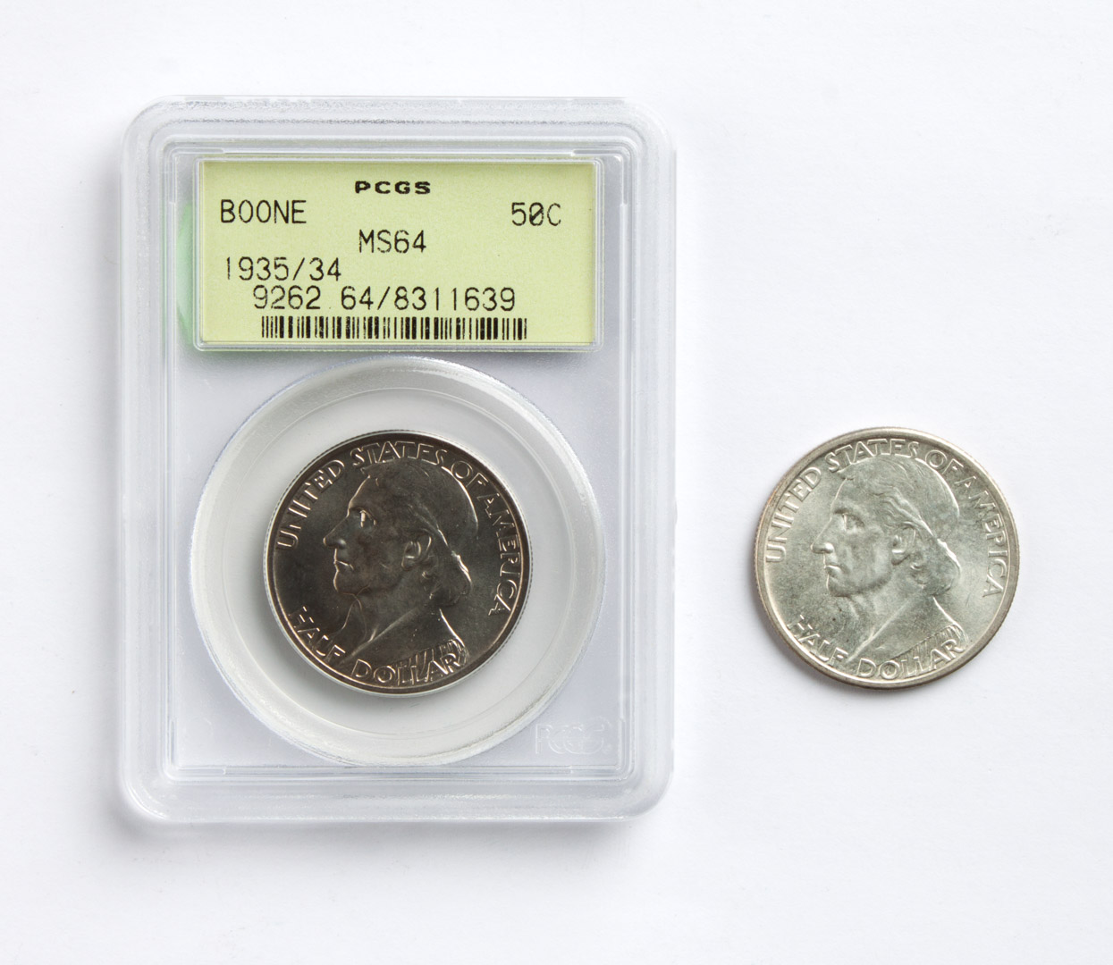 Appraisal: Two Daniel Boone commemorative silver half dollars comprising MS- MS-