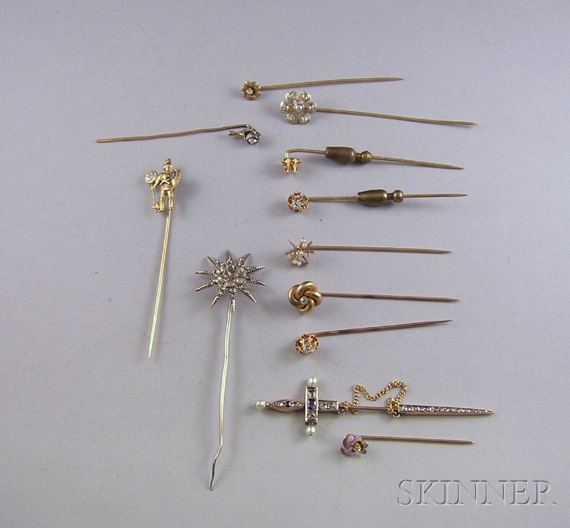 Appraisal: Approximately Twelve Gold and Diamond Stickpins including a knight a