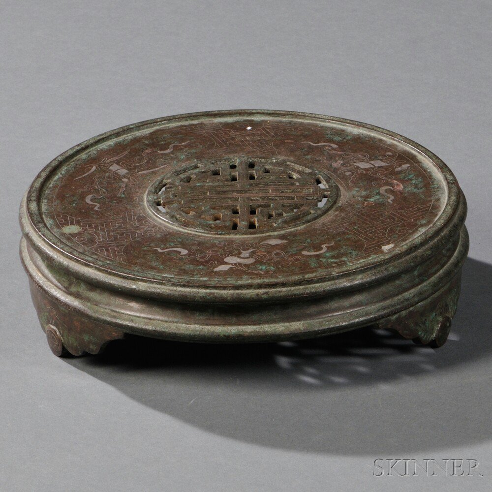 Appraisal: Bronze Stand China the low round stand resting on three