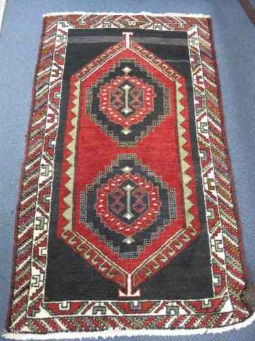 Appraisal: Hamadan Persian Handmade Rug two geometric medallions red indigo field