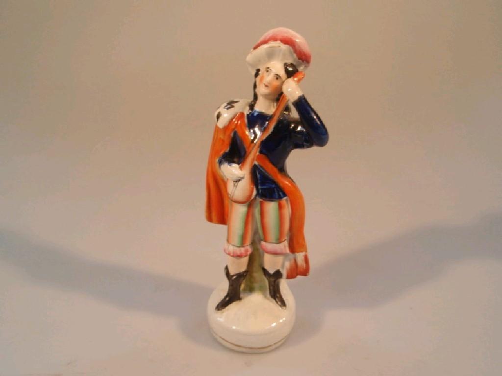 Appraisal: A Victorian Staffordshire figure of a wandering minstrel cm high