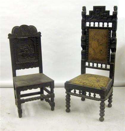 Appraisal: Three Renaissance Revival carved oak hall chairsEach with carved backrests