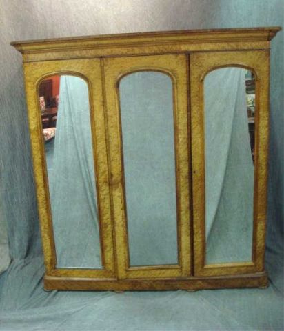 Appraisal: Antique Victorian birdseye maple armoire Disassembles for transport with interior