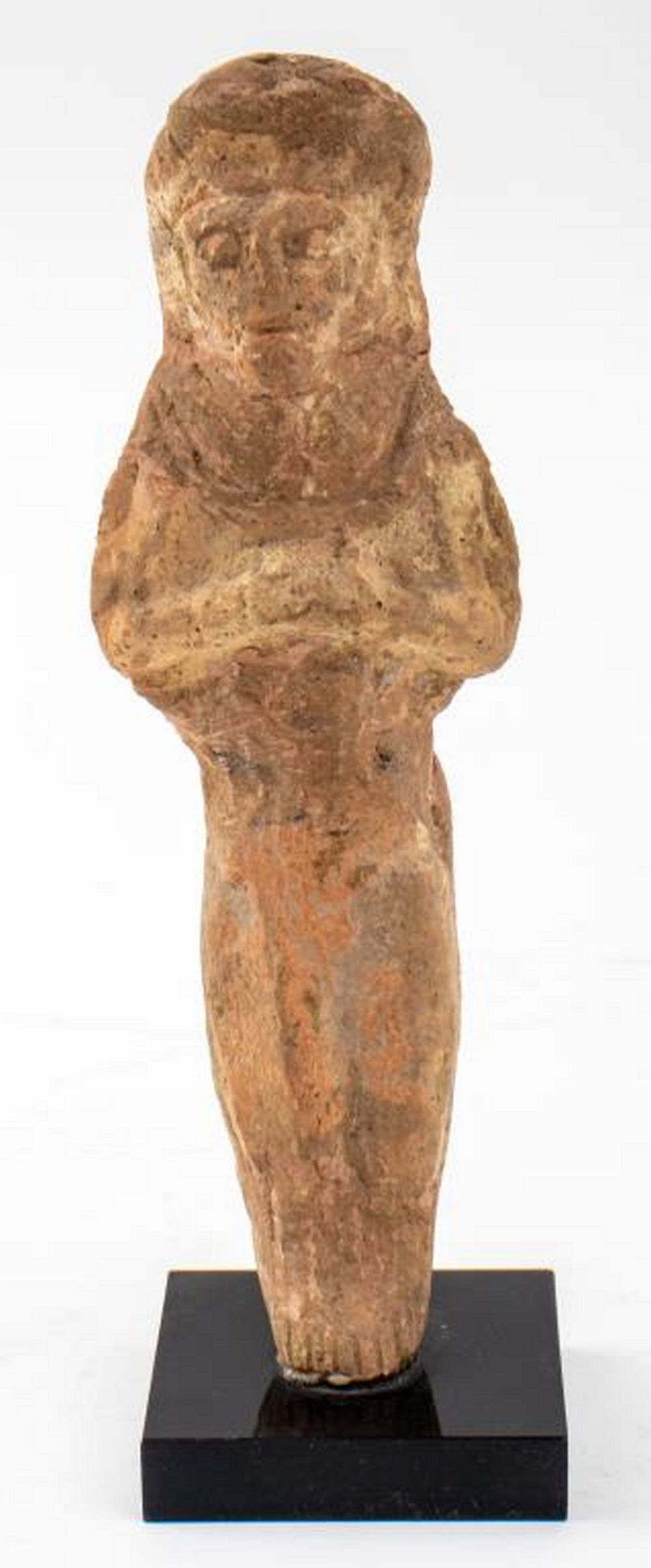 Appraisal: ANCIENT EARTHENWARE FIGURINE Ancient earthenware figurine standing with folded hands