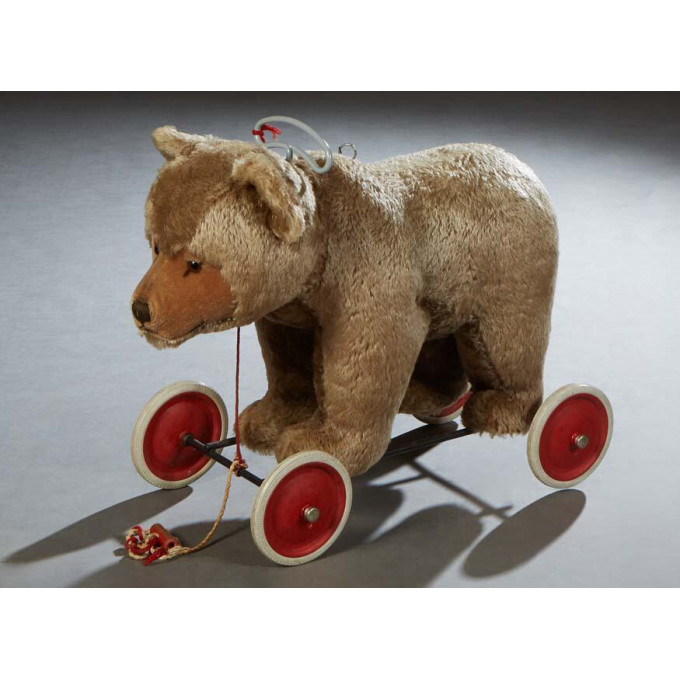 Appraisal: Steiff Bear on Wheels Pull Toy th c with growler