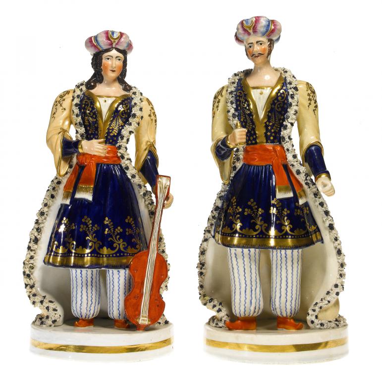 Appraisal: A PAIR OF LLOYD OF SHELTON FIGURES OF CIRCASSIAN MUSICIANS