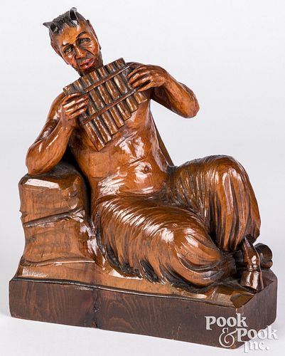 Appraisal: PAN WHISTLER CARVED AND STAINED WOOD FIGUREPan whistler carved and