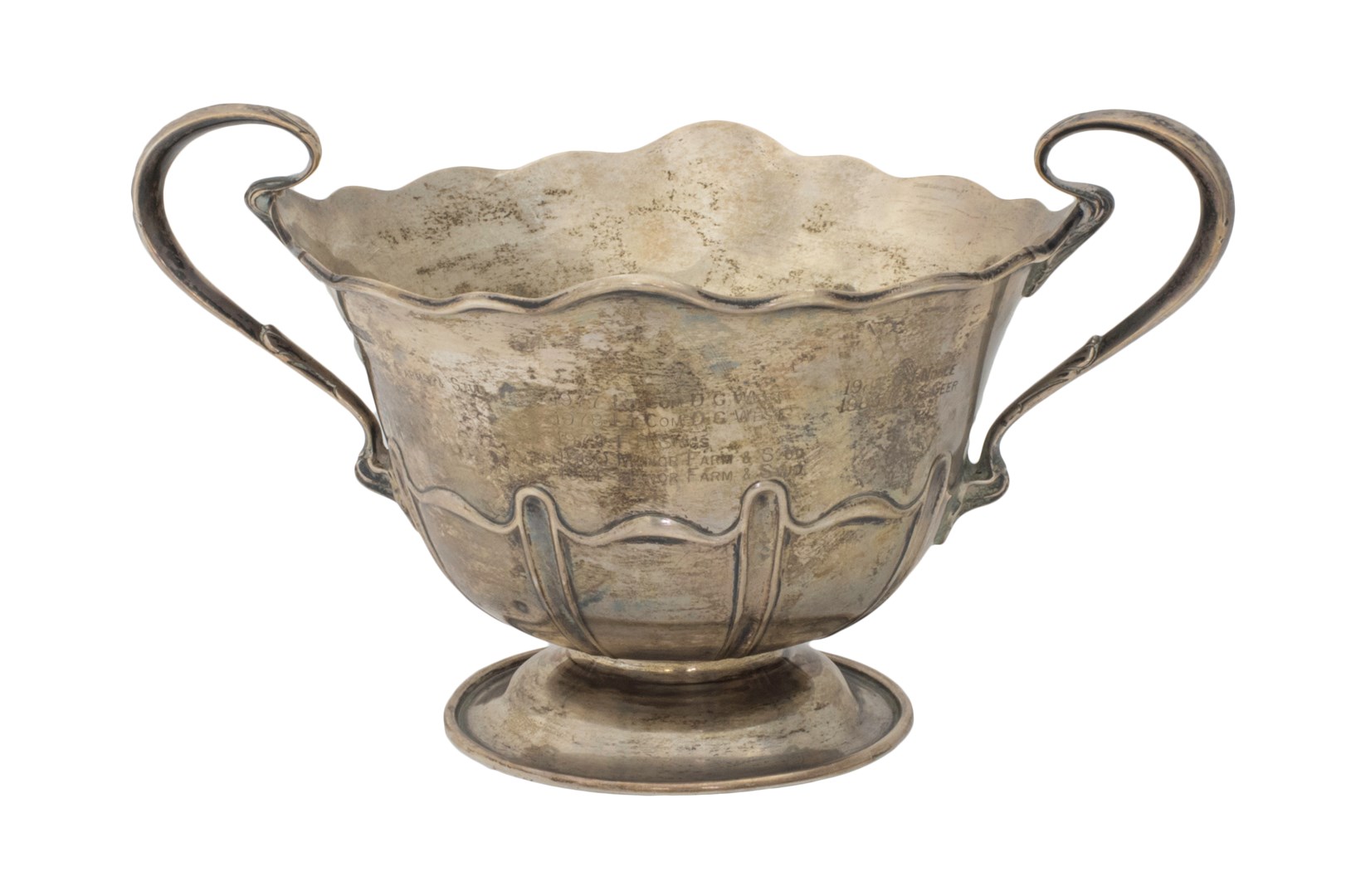 Appraisal: A silver twin handled trophy bowl of panelled form within