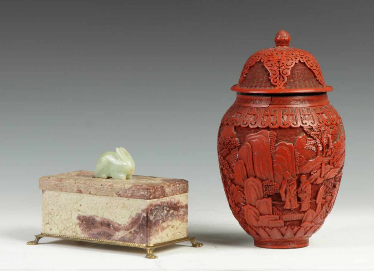 Appraisal: Chinese Cinnabar Covered Jar th cent Deeply carved lotus finial