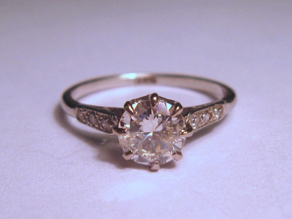 Appraisal: Platinum diamond solitaire ring with brilliant cut diamond measuring approx