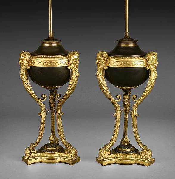 Appraisal: A pair of French gilt and patinated bronze table lamps