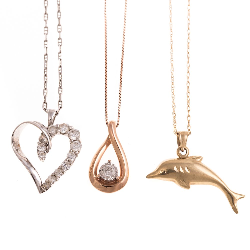 Appraisal: A Trio of Ladies Pendants in Gold K rose gold