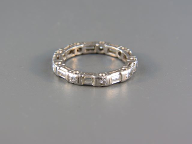 Appraisal: Diamond Platinum Eternity Band diamonds totaling carat alternating round baguette