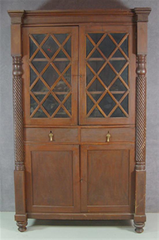 Appraisal: Mahogany Empire Cabinet Circa Two glazed diamond panel doors above