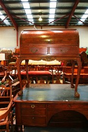 Appraisal: A oak cylinder top writing desk