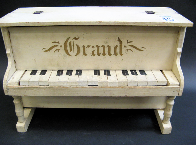 Appraisal: A SHOENHUT CHILD'S WOOD TOY PIANO printed Grand in gold