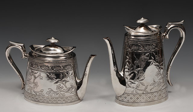 Appraisal: A WALKER HALL SILVER PLATED OVAL TEAPOT and matching coffee