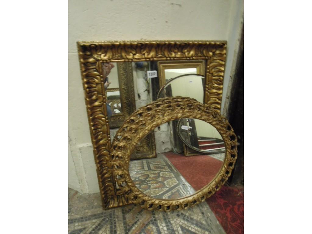 Appraisal: A pair of gilt framed wall mirrors of oval form