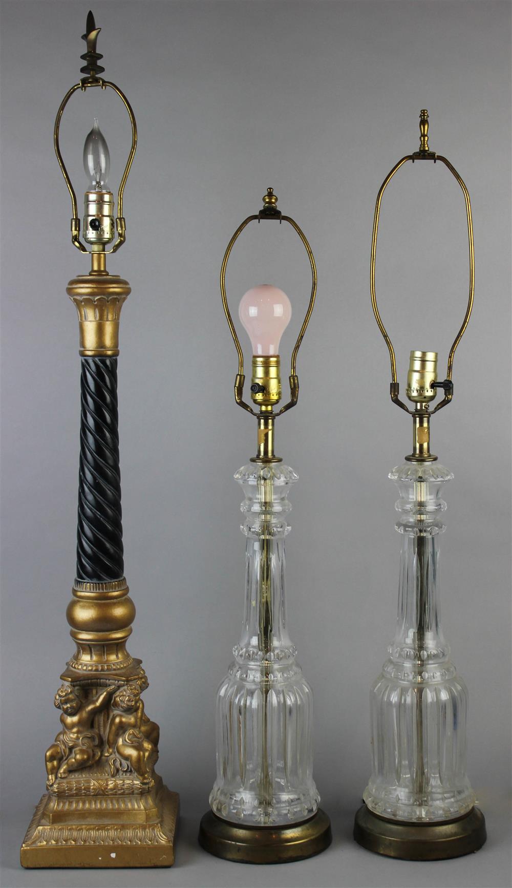 Appraisal: TWO MALLET SHAPED GLASS LAMPS AND A BLACK AND GILT