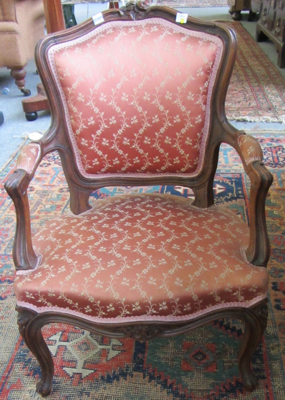 Appraisal: A Louis XV style carved beech fauteuil of small proportions