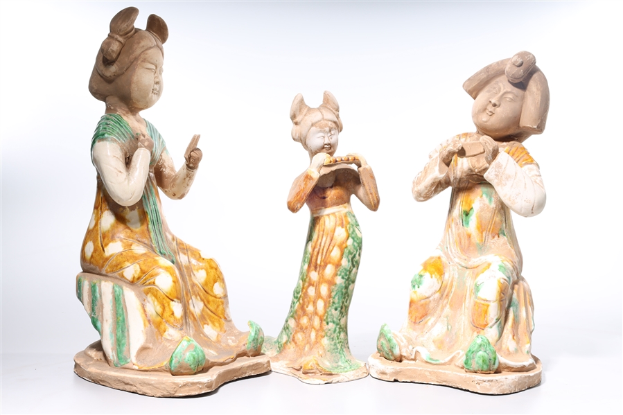 Appraisal: Three Chinese Sancai-style glazed pottery figures x x tallest approx