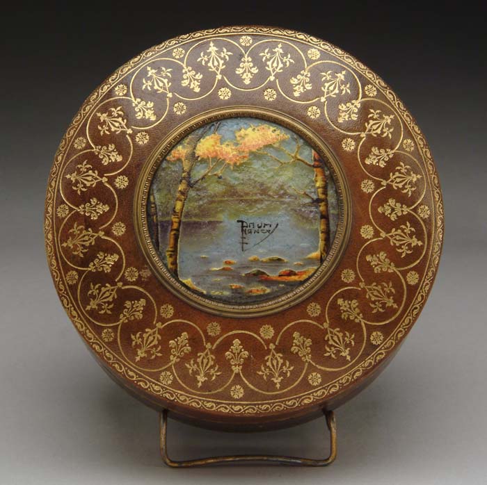 Appraisal: DAUM NANCY LEATHER BOX Brightly colored fall scenic medallion with