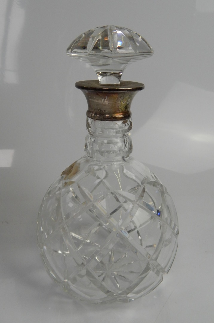 Appraisal: A modern cut glass silver mounted spirit decanter with cut