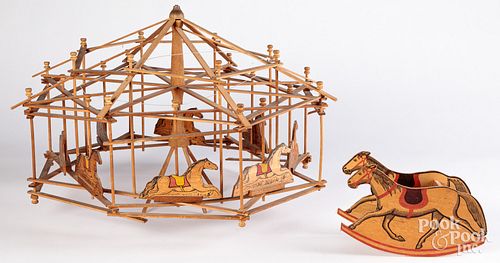 Appraisal: CAROUSEL CONSTRUCTION TOY WITH EIGHT HORSE IMAGESCarousel construction toy with