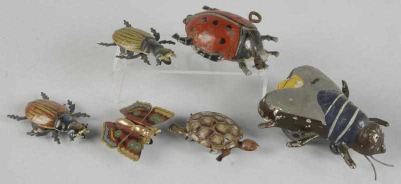 Appraisal: Lot of Tin Litho Insect Animal Toys Description German Most