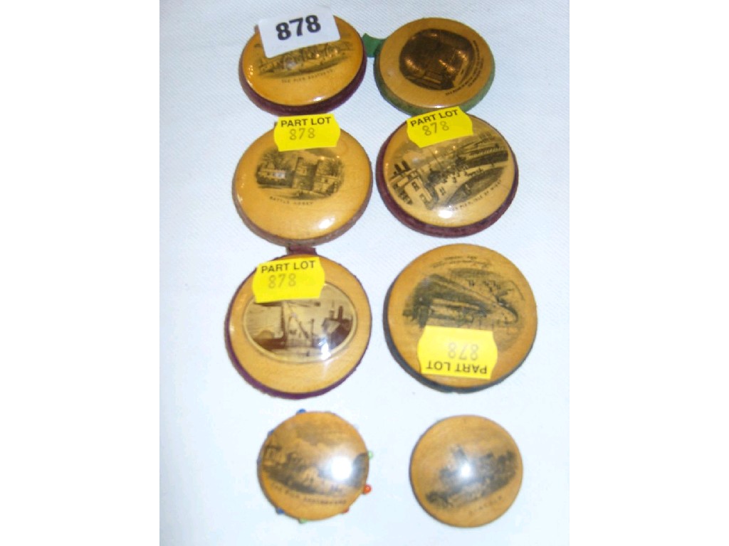 Appraisal: A collection of eight disc shaped circular pin cushions of