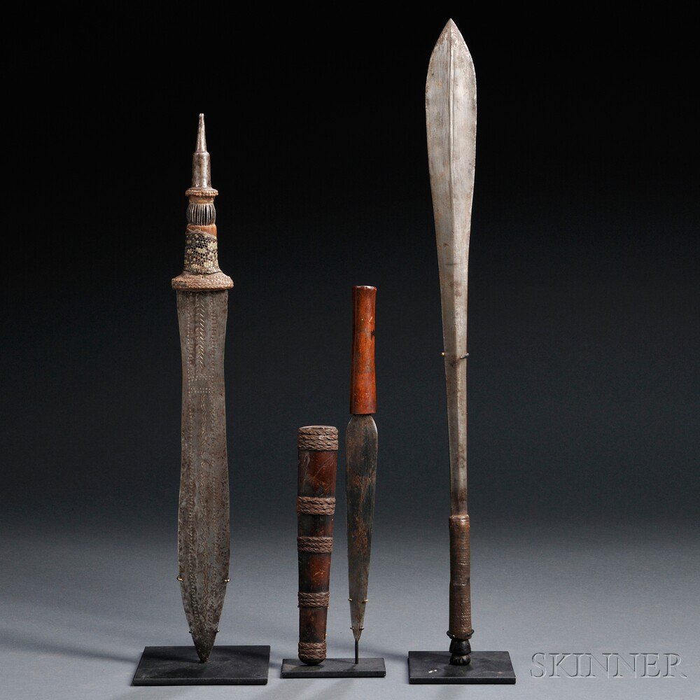 Appraisal: Three African Weapons a Yaka sword a Shona knife with