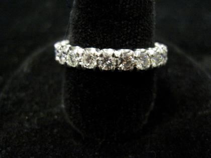 Appraisal: Platinum and diamond eternity bandTwenty-two round cut diamonds approximately carats