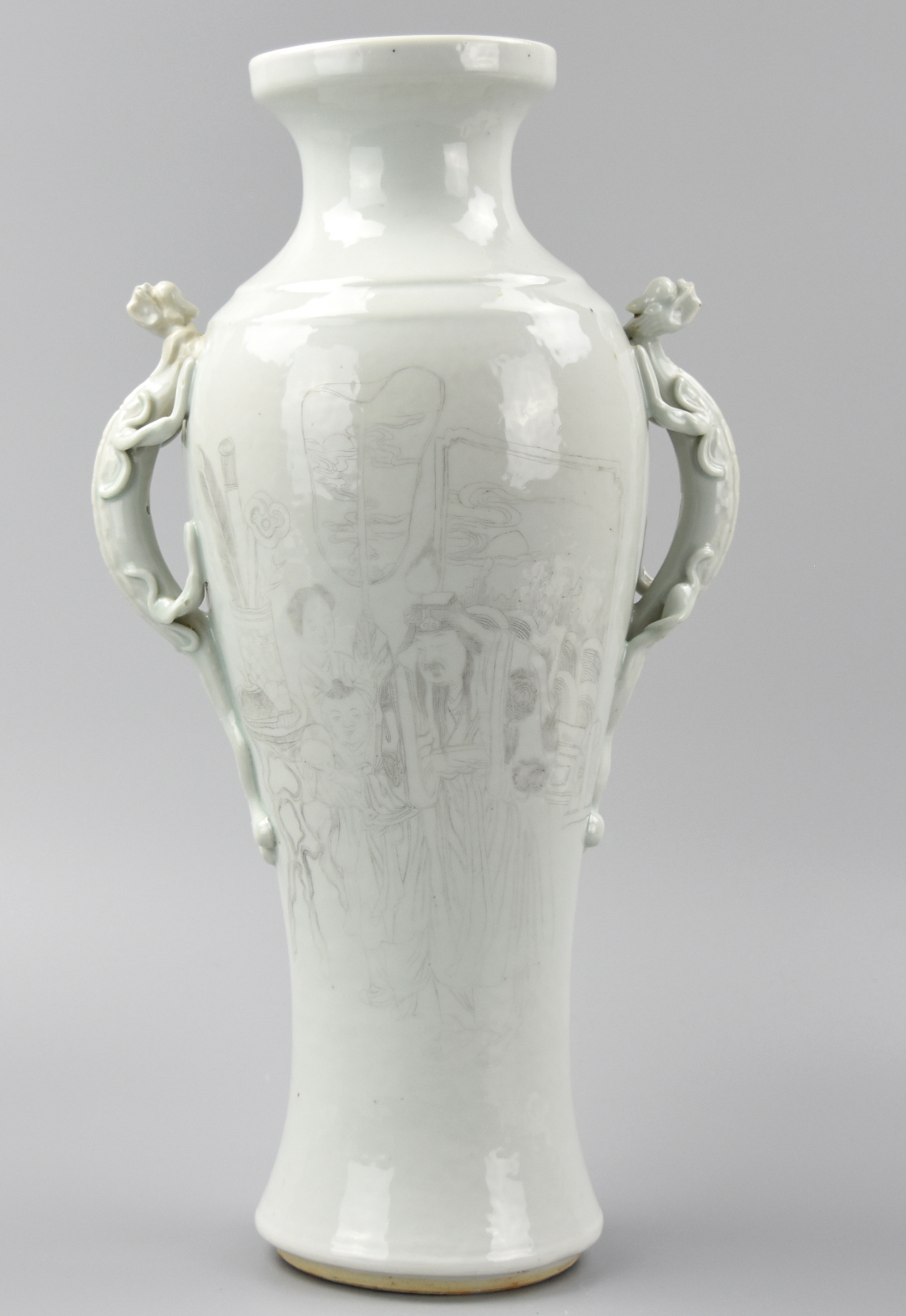 Appraisal: WHITE GLAZED ETCHED VASE W DRAGON HANDLE TH C Chinese