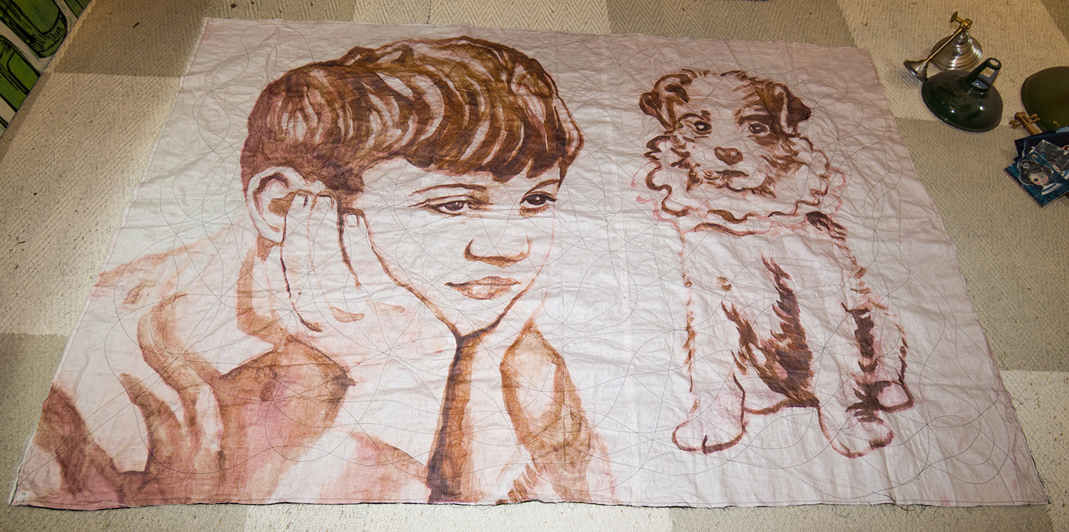 Appraisal: A LARGE DAVID BROMLEY PRINTED QUILT DEPICTING A BOY WITH