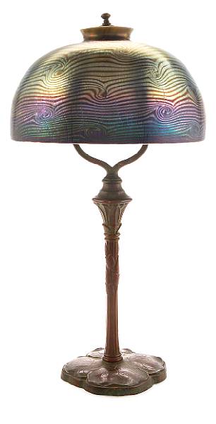 Appraisal: A Tiffany Studios Favrile glass and bronze boudoir lamp -