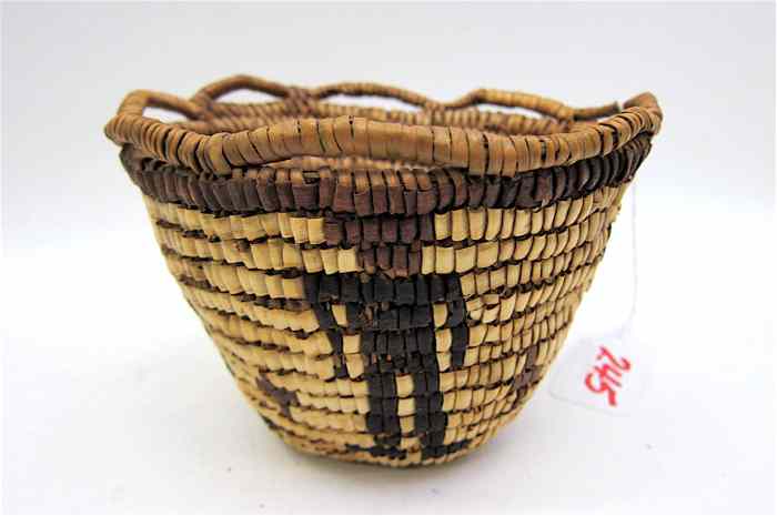 Appraisal: KLICKITAT INDIAN BASKET with design depicting standing men looped rim