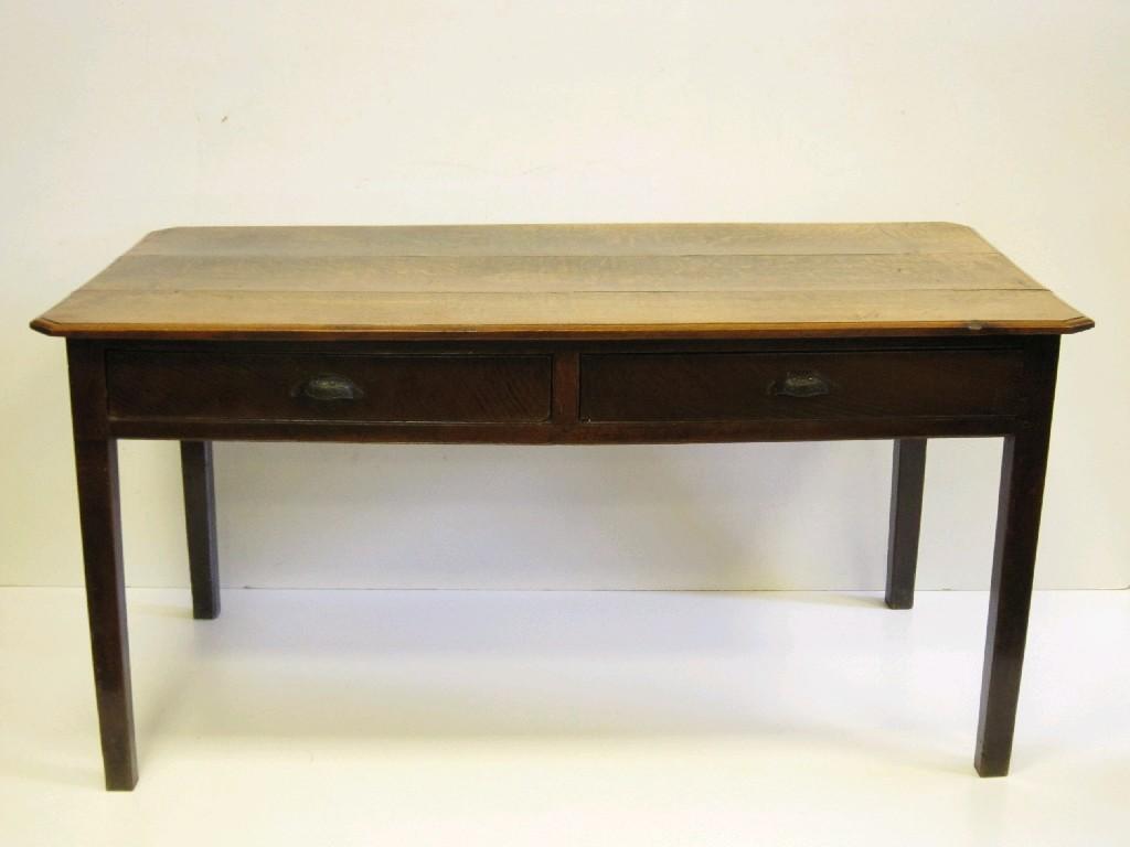 Appraisal: An antique oak Dining Table with three plank top above